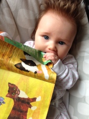 Mya eating her book